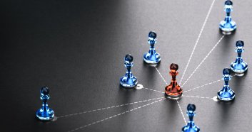 Business links and relationship concept. Red and blue pawns linked by white doted lines over black background. 3d illustration.