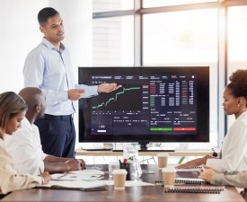 Business people, stock market dashboard on screen and coach for trading, finance presentation and g.