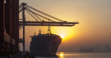 Container ship and cranes at port